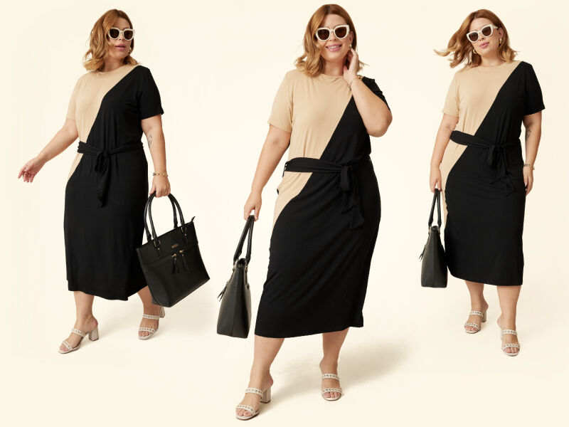 Modelo plus size usando vestido preto e bege