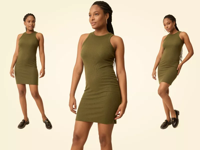 Mulher usando vestido verde em fundo claro