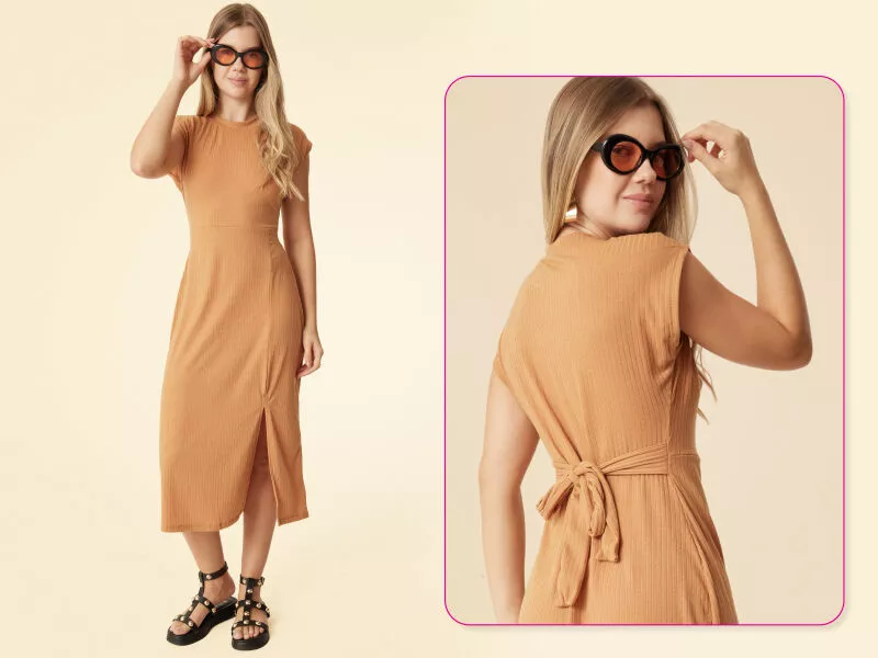 Mulher com vestido laranja e óculos escuros