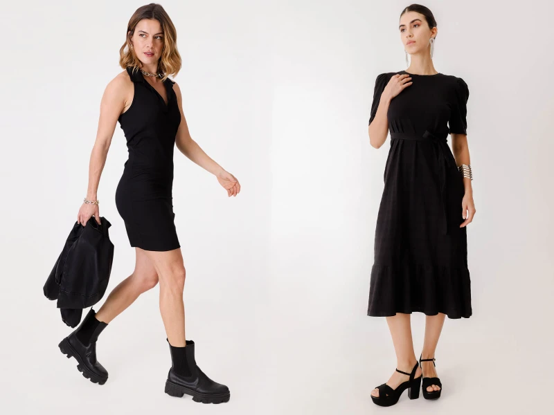 Duas mulheres com vestidos pretos: um curto com botas e um midi com sandálias de salto, sobre fundo branco.