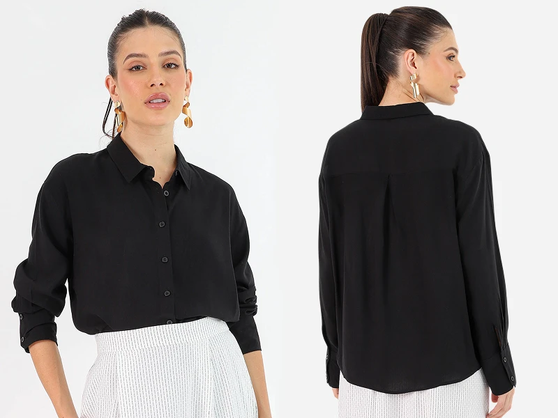 Camisa preta de manga comprida para mulher, vista de frente e de costas, em tecido fluido com gola.