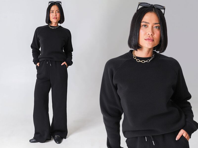 Modelo usando roupa preta estilosa e moderna