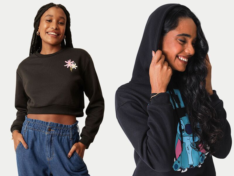 Duas mulheres usando moletom preto estiloso